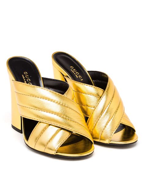 gucci gold padded mules